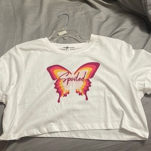 A white crop top original price 17 selling for 15